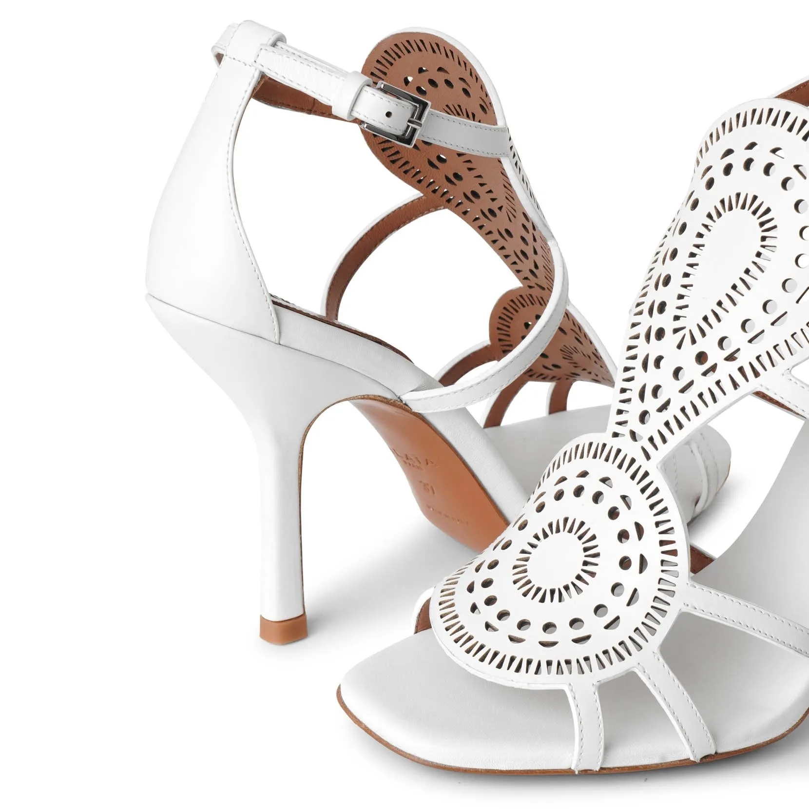 Laser-cut leather sandals